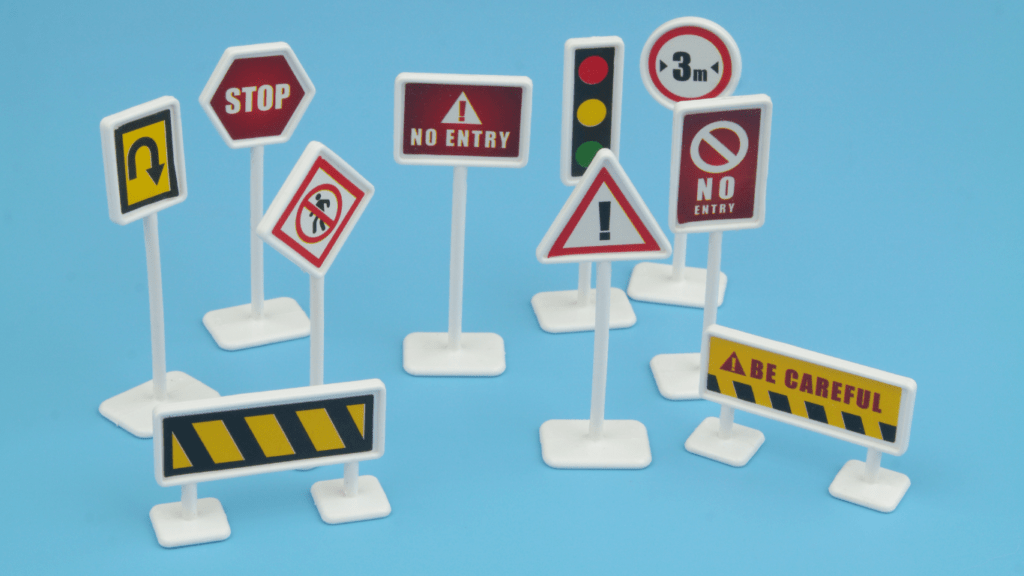 various types of traffic signs on stands