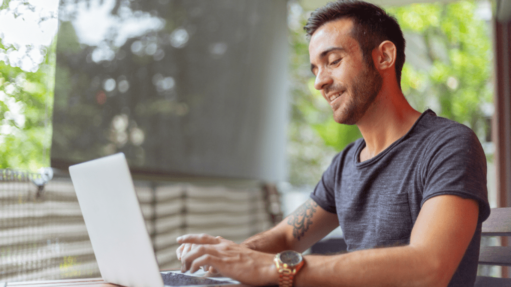 a person working on a laptop outside