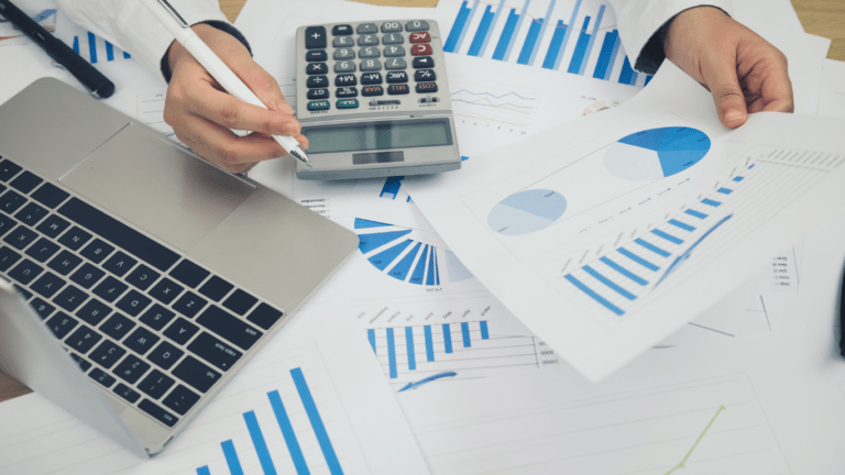 image of a calculator and a piece of paper