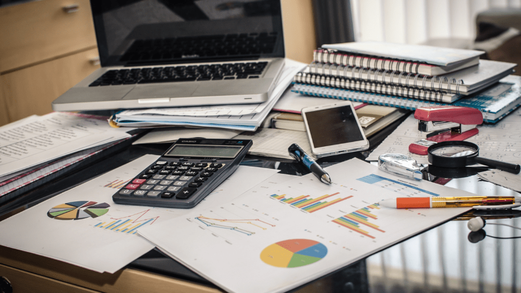 image of a calculator and a piece of paper